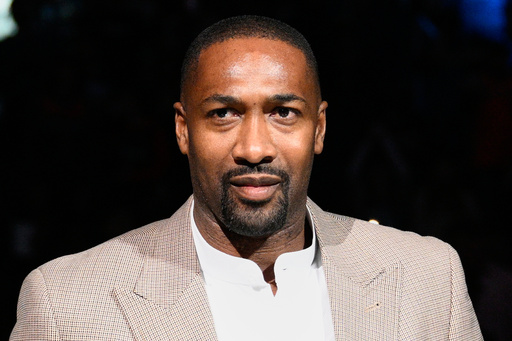 FILE - Former Washington Wizards player Gilbert Arenas takes part in a ceremony during the half-time of an NBA basketball game between the Wizards and the Miami Heat, Friday, Nov. 18, 2022, in Washington. (AP Photo/Nick Wass, File)
