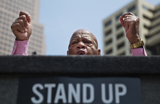 FILE - Rep. John Lewis, D-Ga., addresses a crowd at a rally protesting the National Rifle Association's annual convention a few blocks away in Atlanta, April 29, 2017. (AP Photo/David Goldman, file)