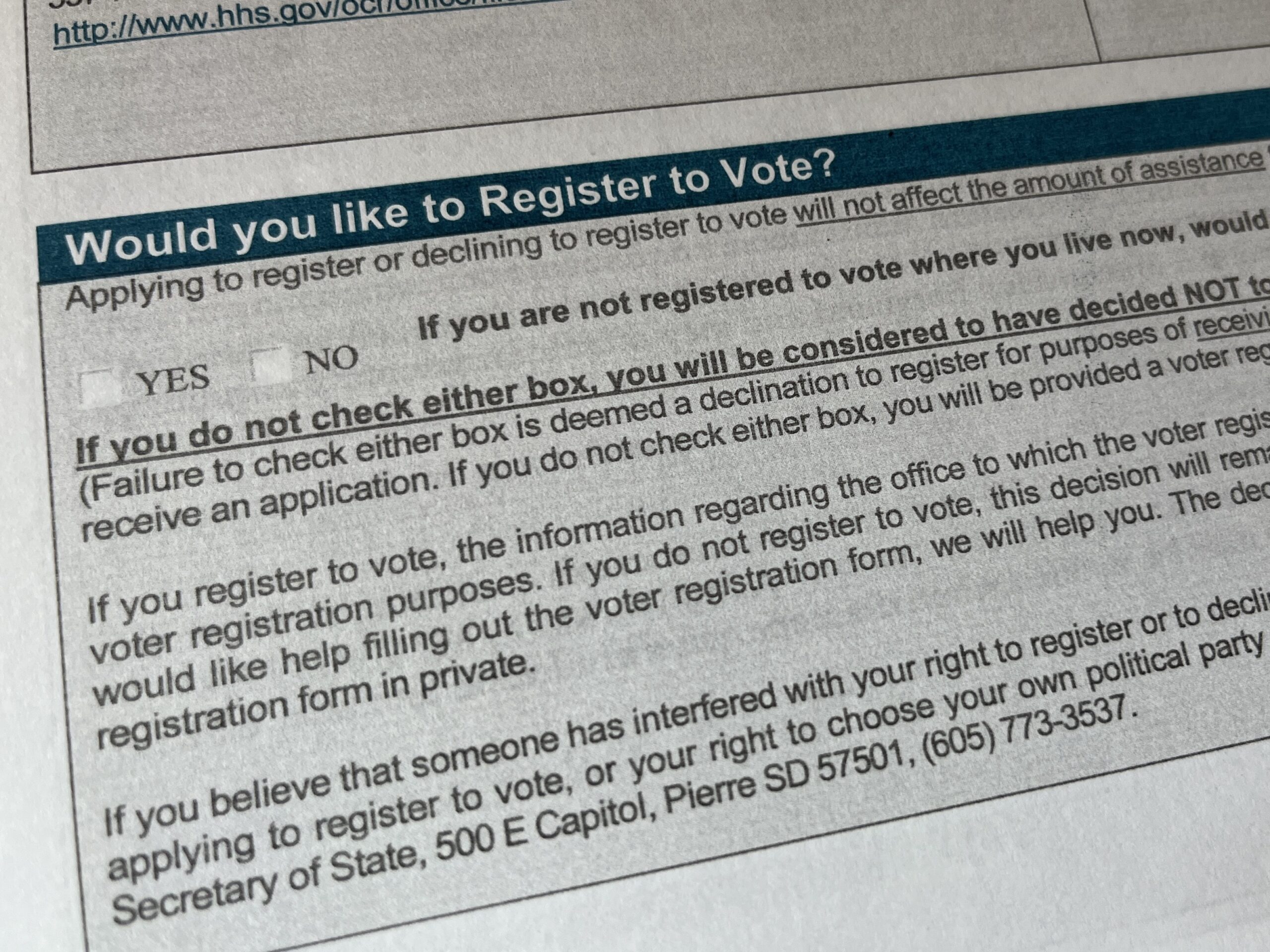 Voter registration checkbox on the South Dakota Department of Social Services economic assistance application. (Makenzie Huber/South Dakota Searchlight)
