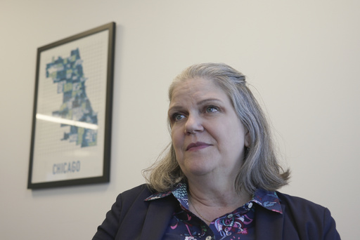Jennifer Peyton sits for an interview in downtown Chicago on July 21, 2025. Peyton was fired from her position as Assistant Chief Immigration Judge on July 3rd, with no cause given. (AP Photo/Laura Bargfeld)