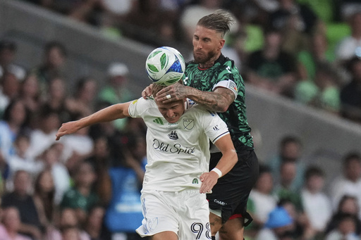 MLS All-Stars' Sam Surridge (98) and Sergio Ramos compete for a pass during the MLS All-Star soccer match in Austin, Texas, Wednesday, July 23, 2025. (AP Photo/Eric Gay)