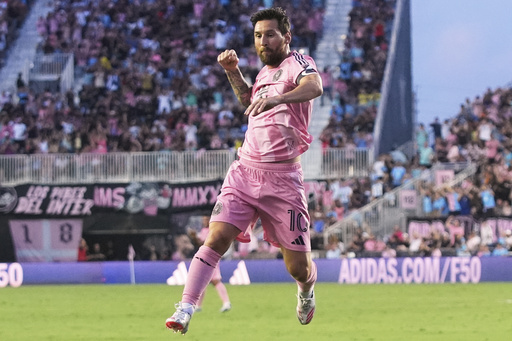 Inter Miami forward Lionel Messi (10) reacts after scoring a goal during the first half of an MLS soccer match against Nashville SC, Saturday, July 12, 2025, in Fort Lauderdale, Fla. (AP Photo/Lynne Sladky)
