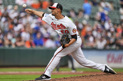 Baltimore Orioles starting pitcher Charlie Morton (50) delivers during the second inning in the first baseball game of a doubleheader against the New York Mets, Thursday, July 10, 2025, in Baltimore. (AP Photo/Stephanie Scarbrough)