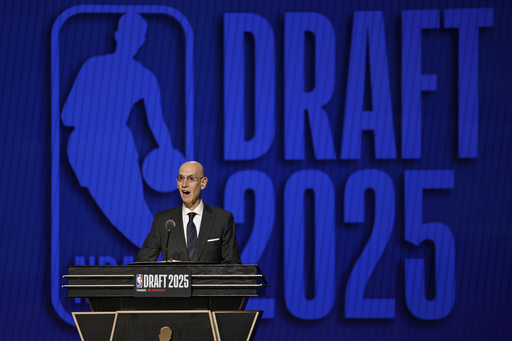 NBA commissioner Adam Silver announces the start of the first round of the NBA basketball draft, Wednesday, June 25, 2025, in New York. (AP Photo/Adam Hunger)