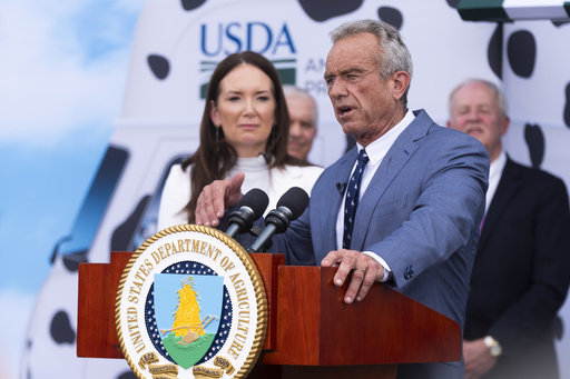Secretary of Health & Human Services Robert F. Kennedy Jr. speaks alongside U.S. Secretary of Agriculture Brooke Rollins, during a ceremony announcing that major U.S. ice cream makers will phase out artificial colors by the end of 2027, at the U.S. Department of Agriculture, Monday, July 14, 2025 in Washington. (AP Photo/Manuel Balce Ceneta)