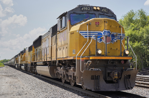 FILE - A Union Pacific train travels through Union, Neb., July 31, 2018. (AP Photo/Nati Harnik, File)
