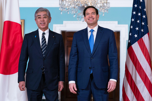 FILE - Secretary of State Marco Rubio, right, and Japanese Foreign Minister Iwaya Takeshi posses for a photo before a bilateral meeting at the State Department in Washington, Tuesday, July 1, 2025. (AP Photo/Jose Luis Magana, File)