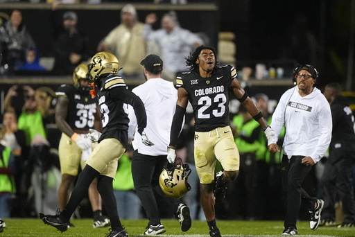 FILE - Colorado safety Carter Stoutmire (23) celebrates after an overtime victory in an NCAA college football game Saturday, Sept. 21, 2024, in Boulder, Colo. (AP Photo/David Zalubowski, FIle)