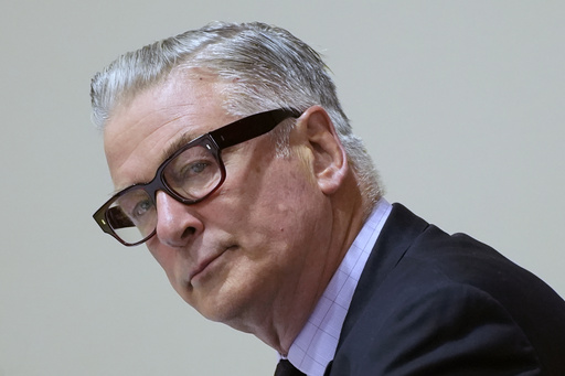 FILE - Actor Alec Baldwin attends his trial for involuntary manslaughter for the 2021 fatal shooting of cinematographer Halyna Hutchins during filming of the Western movie "Rust," July 12, 2024, at the County District Court in Santa Fe, N.M. (Ramsay de Give/Pool Photo via AP, File)