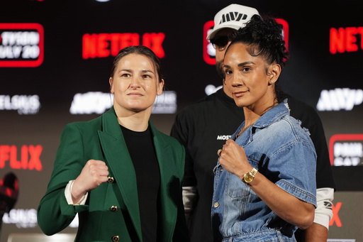 FILE - Katie Taylor, left, and Amanda Serrano pose for photos during a news conference promoting their upcoming boxing bout, May 16, 2024, in Arlington, Texas. (AP Photo/Sam Hodde, File)