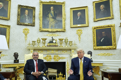 President Donald Trump and Bahrain's Crown Prince Salman bin Hamad Al Khalifa speak in the Oval Office of the White House, Wednesday, July 16, 2025, in Washington. (AP Photo/Alex Brandon)
