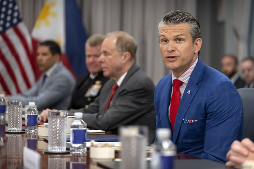 Secretary of Defense Pete Hegseth attends a meeting with Philippine President Ferdinand Marcos Jr. at the Pentagon, Monday, July 21, 2025, in Washington. (AP Photo/Mark Schiefelbein)