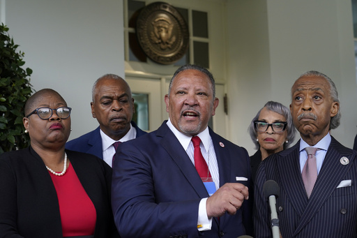 FILE - Marc Morial, center, President and Chief Executive Officer of the National Urban League, talks with reporters outside the West Wing of the White House in Washington, July 8, 2021, following a meeting with President Joe Biden and leadership of top civil rights organizations. (AP Photo/Susan Walsh, File)
