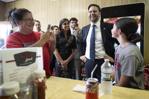 Vice President JD Vance and second lady Usha Vance, greet patrons during a surprise stop at the Majestic Lunch diner in Pittston, Pa., Wednesday. July 16, 2025. (Saul Loeb/Pool via AP)