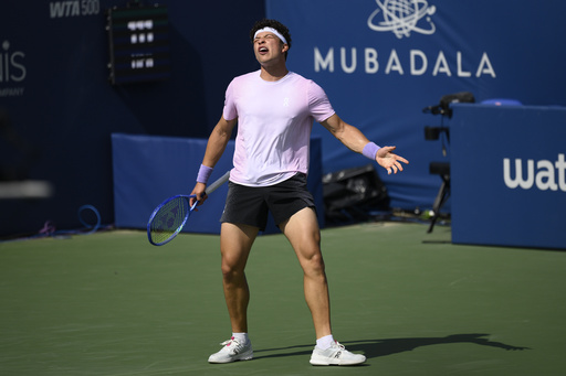 Ben Shelton reacts during a match against Gabriel Diallo, of Canada, at the Citi Open tennis tournament Thursday, July 24, 2025, in Washington. (AP Photo/Nick Wass)