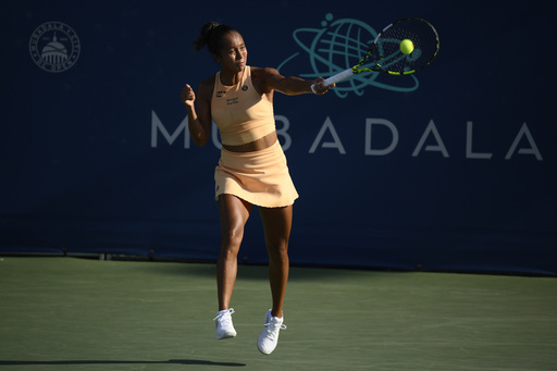 Leylah Fernandez, of Canada, returns the ball against Jessica Pegula during a match at the Citi Open tennis tournament Thursday, July 24, 2025, in Washington. (AP Photo/Nick Wass)