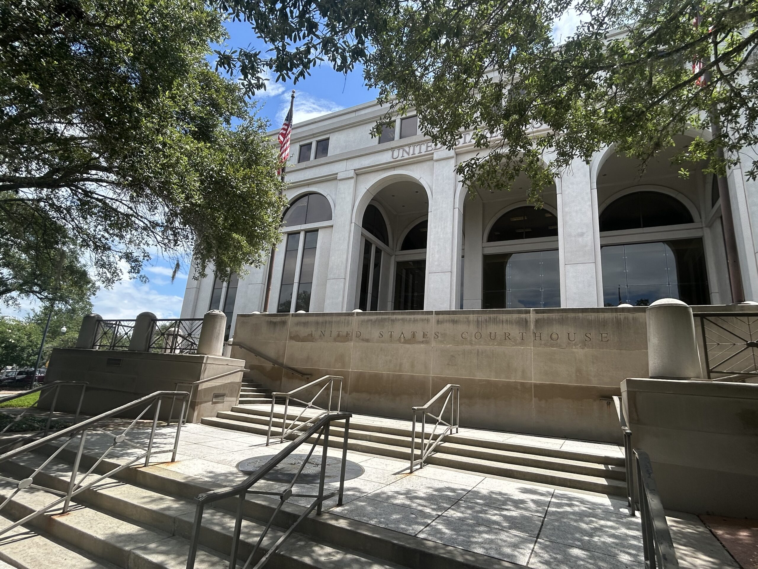The Joseph Woodrow Hatchett United States Courthouse and Federal Building in downtown Tallahassee, Florida, where Deputy Attorney General Todd Blanche met on Thursday, July 24, 2025, with David O. Markus, lawyer for Ghislaine Maxwell. Maxwell, former girlfriend of late financier and Florida sex offender Jeffrey Epstein, is serving a 20-year sentence at a Tallahassee federal prison for conspiring with Epstein to sexually abuse girls. (Photo by Christine Sexton/Florida Phoenix)