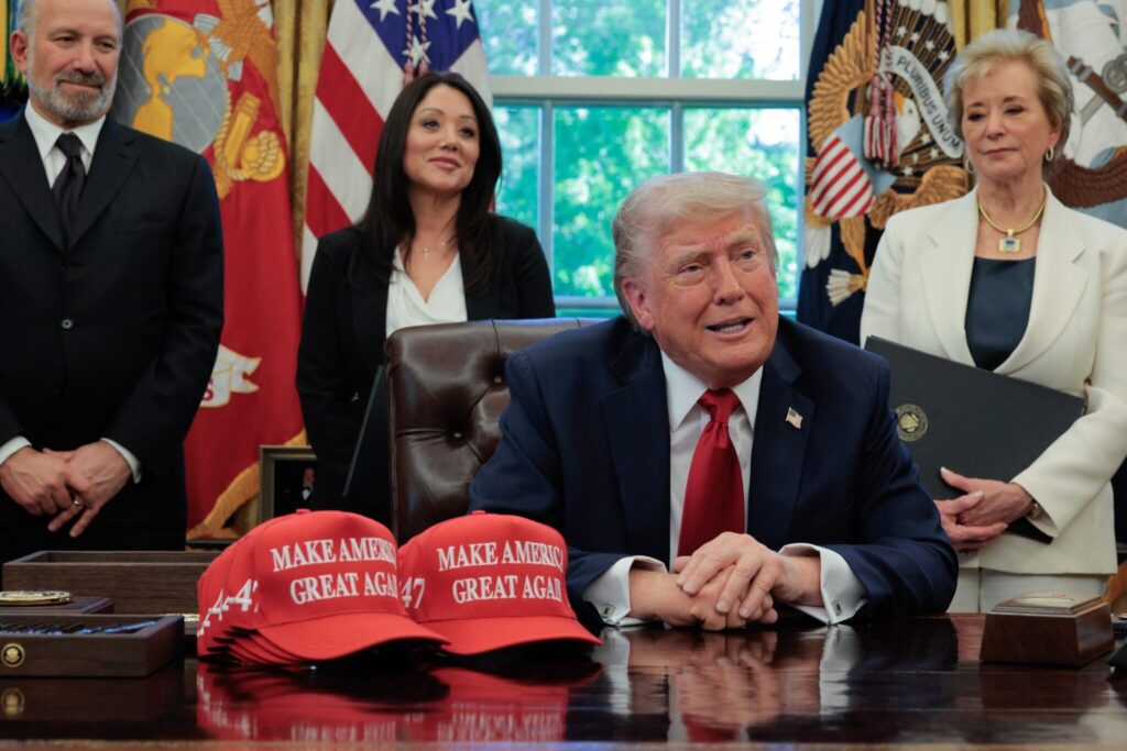 President Donald Trump speaks to reporters after signing executive orders in the Oval Office on April 23, 2025. Secretary of Commerce Howard Lutnick, Secretary of Labor Lori Chavez-DeRemer and Secretary of Education Linda McMahon look on. (Photo by Chip Somodevilla/Getty Images)  