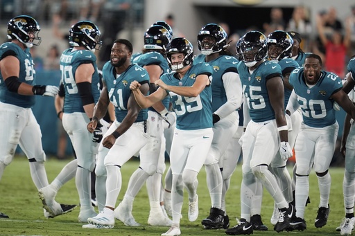 Jacksonville Jaguars place kicker Cam Little (39) celebrates a field goal during the first half of an NFL preseason football game against the Pittsburgh Steelers, Saturday, Aug. 9, 2025, in Jacksonville, Fla. (AP Photo/John Raoux)