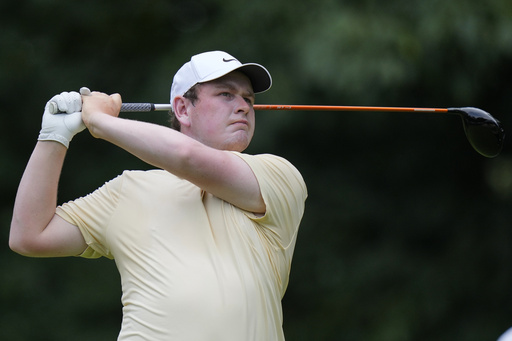 Robert MacIntyre, of Scotland, hits from the fifth tee during the third round of the BMW Championship golf tournament Saturday, Aug. 16, 2025, in Owings Mills, Md. (AP Photo/Stephanie Scarbrough)