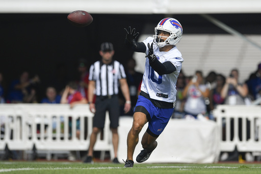 Buffalo Bills wide receiver Khalil Shakir (10) catches a pass during practice at the team's NFL football training camp, Sunday, July 27, 2025, in Pittsford, N.Y. (AP Photo/Adrian Kraus)