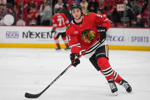 FILE - Chicago Blackhawks center Frank Nazar warms up before an NHL hockey game against the Dallas Stars, Dec. 29, 2024, in Chicago. (AP Photo/Erin Hooley, File)