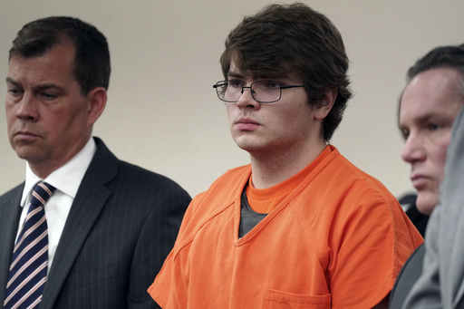 FILE - Payton Gendron, center, listens as he is sentenced, Feb 15, 2023, in Buffalo, N.Y. (Derek Gee/The Buffalo News via AP, Pool, File)