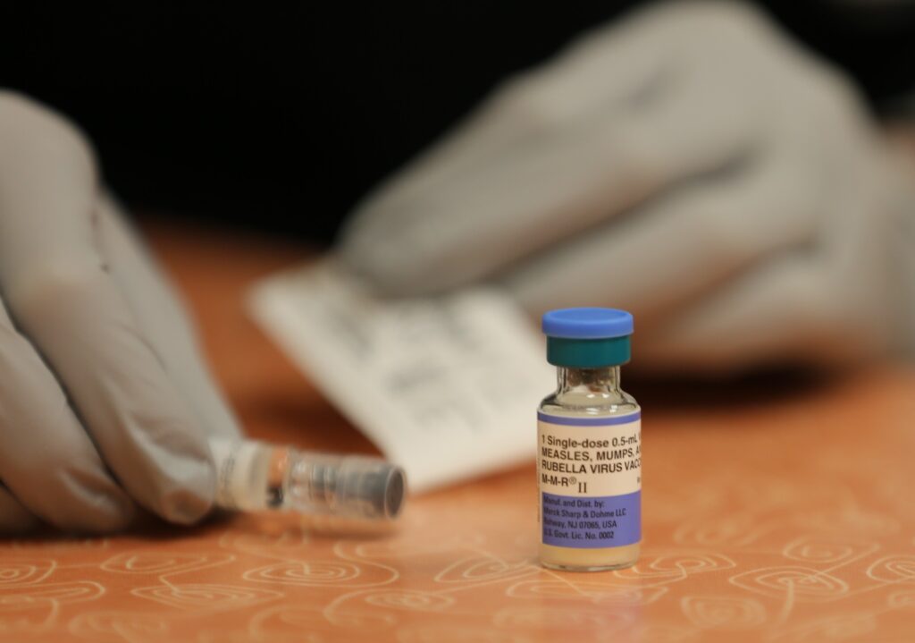 A nurse readies an MMR vaccine at Sanford Children's Hospital in Sioux Falls. (Joshua Haiar/South Dakota Searchlight)