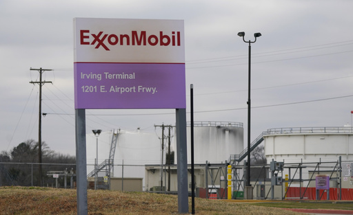 File - A sign marks the entrance to an ExxonMobil fuel storage and distribution facility in Irving, Texas, Jan. 25, 2023. Exxon Mobil reports earnings on Friday, Oct. 27, 2023 (AP Photo/LM Otero, File)