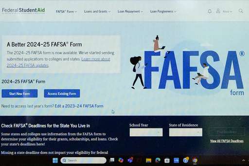 FILE - FAFSA website is seen on Adjovi Golo's laptop at DePaul University in Chicago, Aug. 28, 2024. (AP Photo/Nam Y. Huh, File)