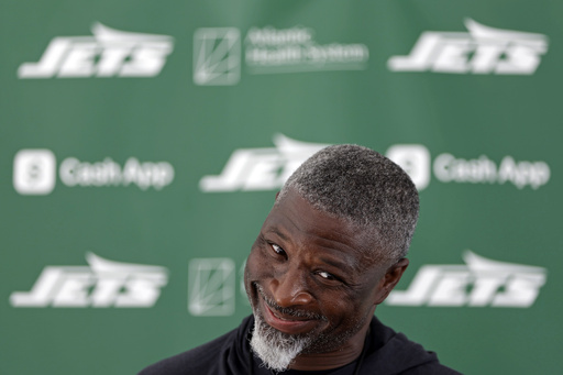 New York Jets head coach Aaron Glenn speaks to the media after practice at the team's NFL football training camp, Wednesday, July 23, 2025, in Florham Park, N.J. (AP Photo/Adam Hunger)