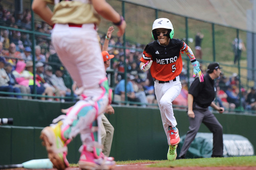 Fairfield, Conn.'s Charlie McCullough scores against Las Vegas, Nev., during the third inning of a baseball game at the Little League World Series, Wednesday, Aug. 20, 2025, in South Williamsport, Pa. (AP Photo/Jared Freed)
