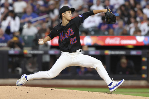New York Mets pitcher Jonah Tong throws during the second inning of a baseball game against the Miami Marlins, Friday, Aug. 29, 2025, in New York. (AP Photo/Pamela Smith)