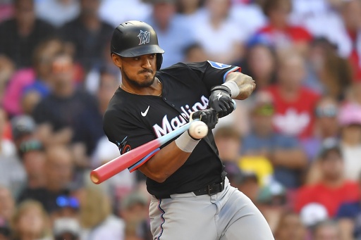 Miami Marlins' Dane Myers uses a bat decorated for players' weekend as he swings at a pitch in the seventh inning of a baseball game against the Boston Red Sox, Saturday, Aug. 16, 2025, in Boston. (Photo/Steven Senne)