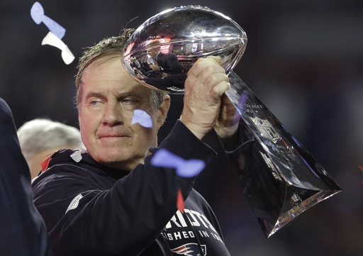 FILE - New England Patriots head coach Bill Belichick holds up the Vince Lombardi Trophy as he celebrates after the Patriots defeated the Seattle Seahawks 28-24 in NFL Super Bowl XLIX football game Sunday, Feb. 1, 2015, in Glendale, Ariz. (AP Photo/Patrick Semansky, File)