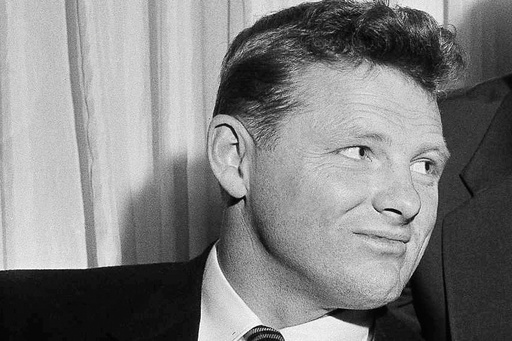 FILE - Billy Howton of the Green Bay Packers in Philadelphia, on Jan. 27, 1958, after a conference on the feasibility of a player pension plan. (AP Photo/Bill Ingraham)
