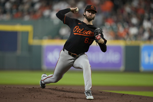 Baltimore Orioles starting pitcher Brandon Young throws during the first inning of a baseball game against the Houston Astros in Houston, Friday, Aug. 15, 2025. (AP Photo/Ashley Landis)