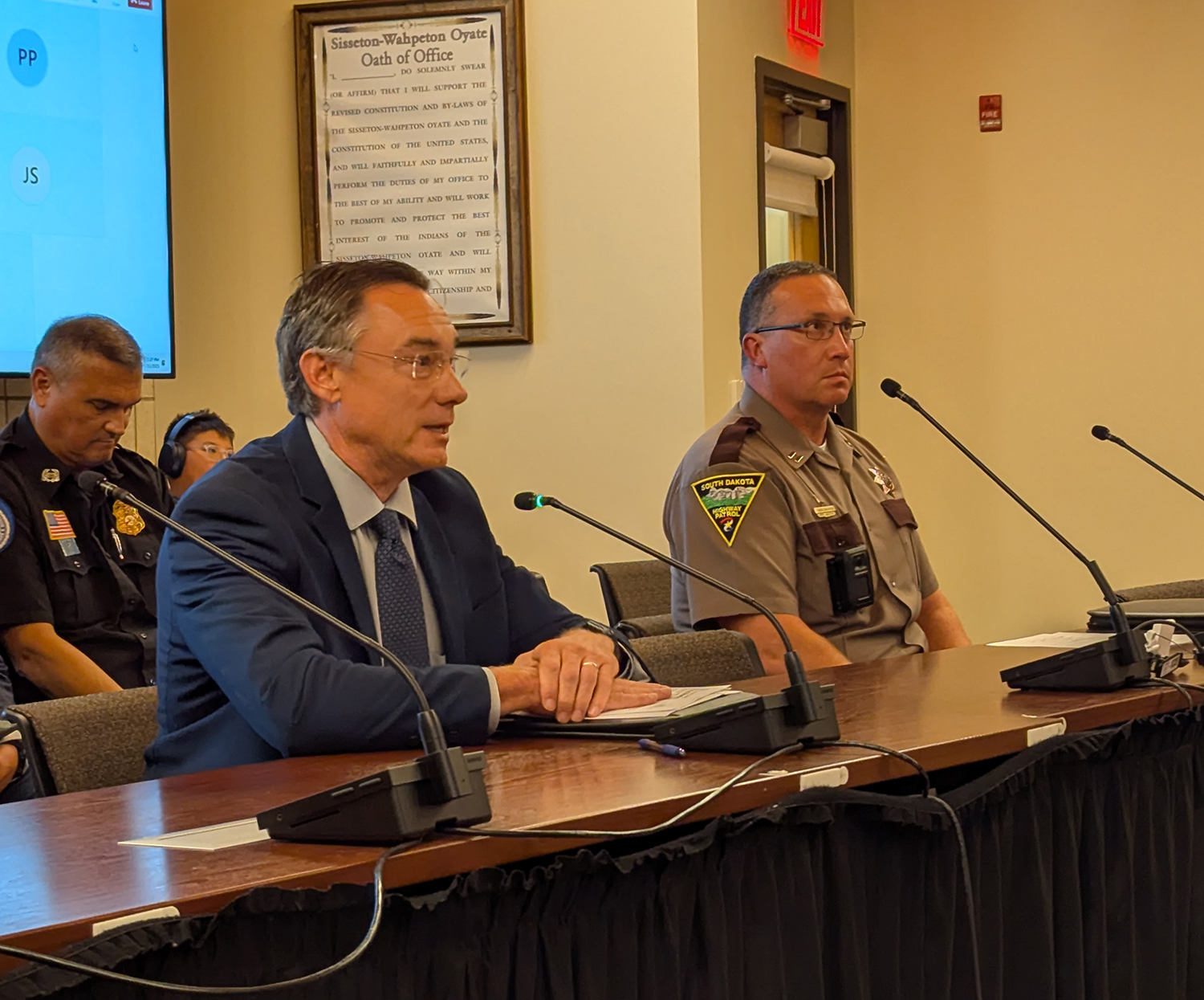 Department of Public Safety Secretary Bob Perry, left, and Highway Patrol Captain Randi Erickson speak to the State-Tribal Relations Committee on July 31, 2025 in Agency Village. (John Hult/South Dakota Searchlight)