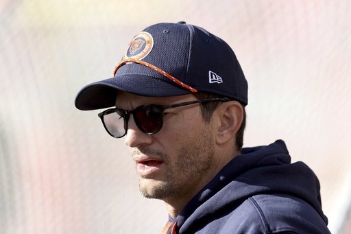 FILE - Ashton Kutcher walks on the field before an NFL football game between the San Francisco 49ers and the Chicago Bears, Dec. 8, 2024, in Santa Clara, Calif. (AP Photo/Scot Tucker, file)