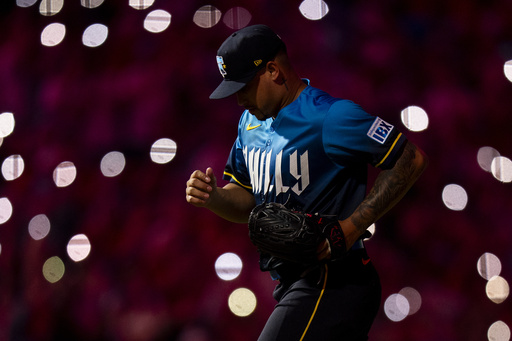 Philadelphia Phillies relief pitcher Jhoan Duran comes into baseball game during the ninth inning against the Detroit Tigers, Friday, Aug. 1, 2025, in Philadelphia. (AP Photo/Chris Szagola)