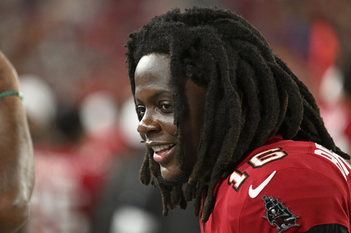 Tampa Bay Buccaneers quarterback Teddy Bridgewater watches during the second half of an NFL preseason football game against the Tennessee Titans on Saturday, Aug. 9, 2025, in Tampa, Fla. (AP Photo/Jason Behnken)