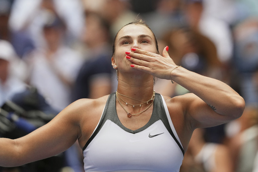 Aryna Sabalenka, of Belarus, celebrates after defeating Rebeka Masarova, of Switzerland, during the first round of the US Open tennis championships, Sunday, Aug. 24, 2025, in New York. (AP Photo/Kirsty Wigglesworth)