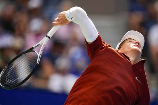 Jannik Sinner, of Italy, serves to Vit Kopriva, of the Czech Republic, during the first round of the U.S. Open tennis championships, Tuesday, Aug. 26, 2025, in New York. (AP Photo/Yuki Iwamura)