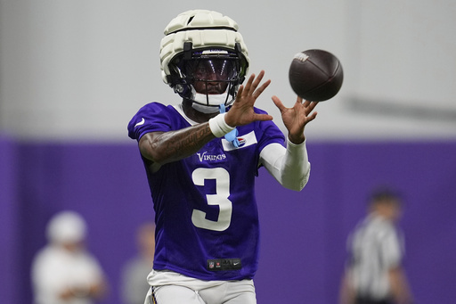 Minnesota Vikings wide receiver Jordan Addison (3) takes part in drills during the team's NFL football training camp Wednesday, July 23, 2025, in Eagan, Minn. (AP Photo/Abbie Parr)