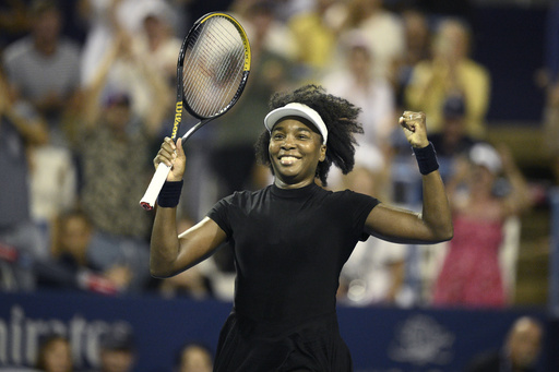 Venus Williams celebrates her win over Peyton Stearns during a match at the Citi Open tennis tournament Tuesday, July 22, 2025, in Washington. (AP Photo/Nick Wass)