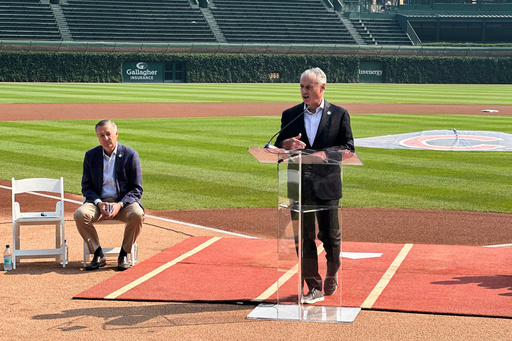 MLB commissioner Rob Manfred announces that Wrigley Field will host the 2027 All-Star Game as Chicago Cubs chairman Tom Ricketts looks on during a baseball news conference Friday, Aug. 1, 2025, in Chicago. (AP Photo/Andrew Seligman)