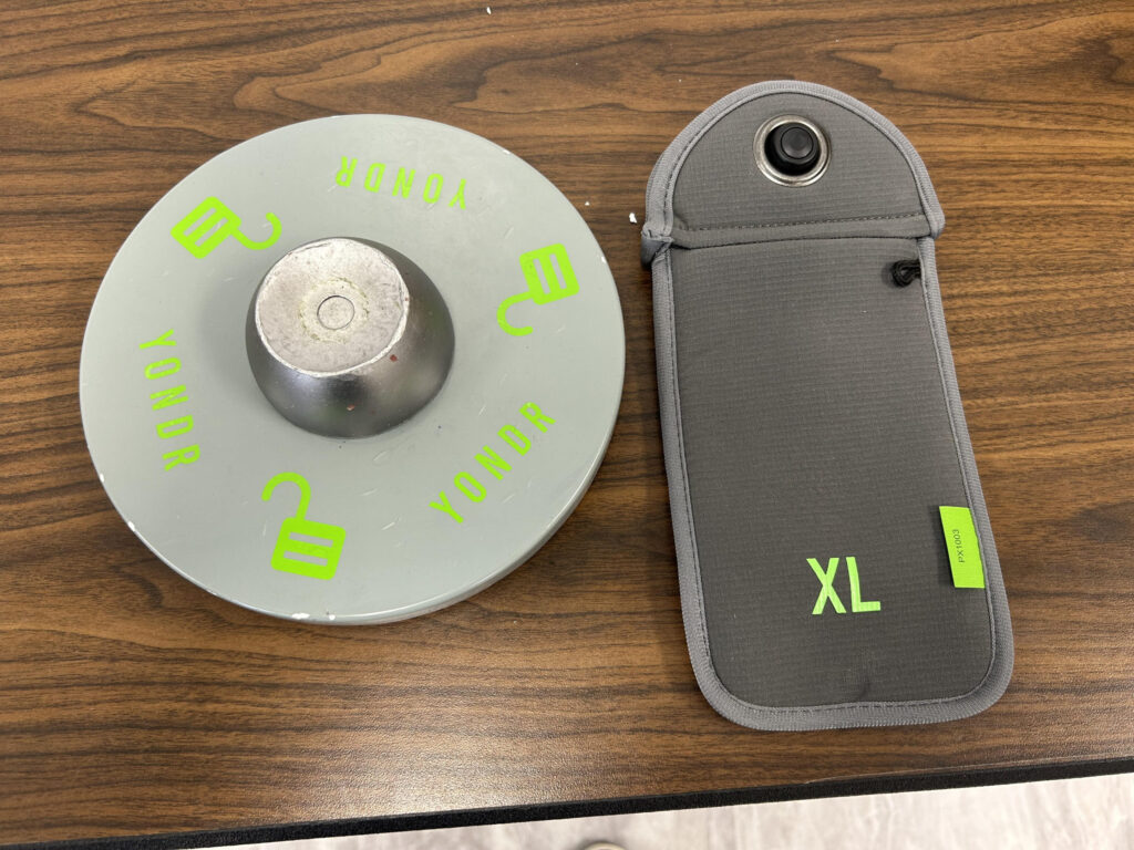 The Platte-Geddes School District used Yondr locked pouches before switching to another company this year. Gettysburg School District will continue to use Yondr pouches. (Courtesy of Platte-Geddes School District)
