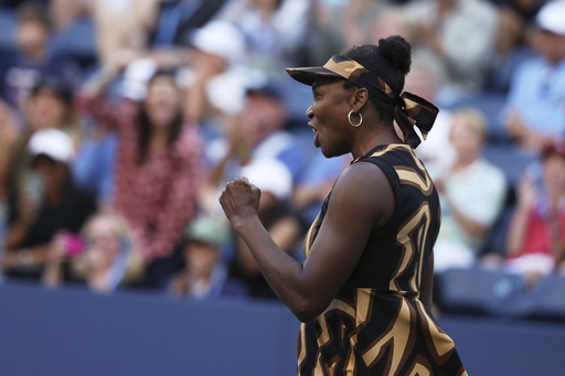 Venus Williams, of the United States, reacts with partner Leylah Fernandez, of Canada, during a third-round doubles match of the U.S. Open tennis championships, Monday, Sept. 1, 2025, in New York. (AP Photo/Heather Khalifa)