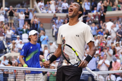 Felix Auger-Aliassime, of Canada, reacts after defeating Alex de Minaur, of Australia, during the quarterfinal round of the U.S. Open tennis championships, Wednesday, Sept. 3, 2025, in New York. (AP Photo/Yuki Iwamura)