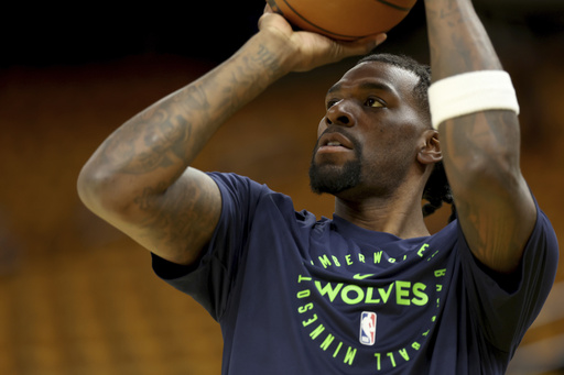 FILE - Minnesota Timberwolves center Naz Reid warms up prior to Game 4 in the Western Conference semifinals of the NBA basketball playoffs against the Golden State Warriors, Monday, May 12, 2025, in San Francisco. (AP Photo/Jed Jacobsohn, file)